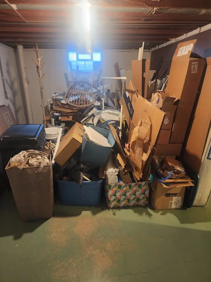 Roll-off dumpster container at job site for 15 Yard Dumpster Rental in Benner